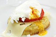 Crumpet with Poached Egg, Cheese & Tomato
